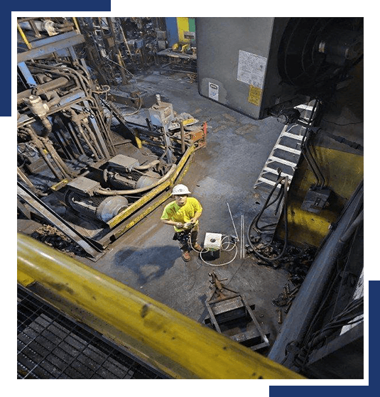 HSI Crew Member in a factory