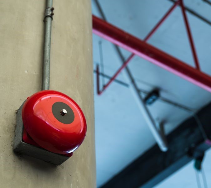 Fire alarm bell in a manufacturing environment