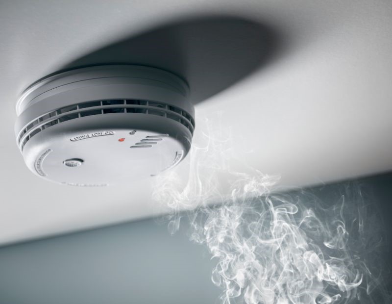 Smoke rising toward a smoke detector